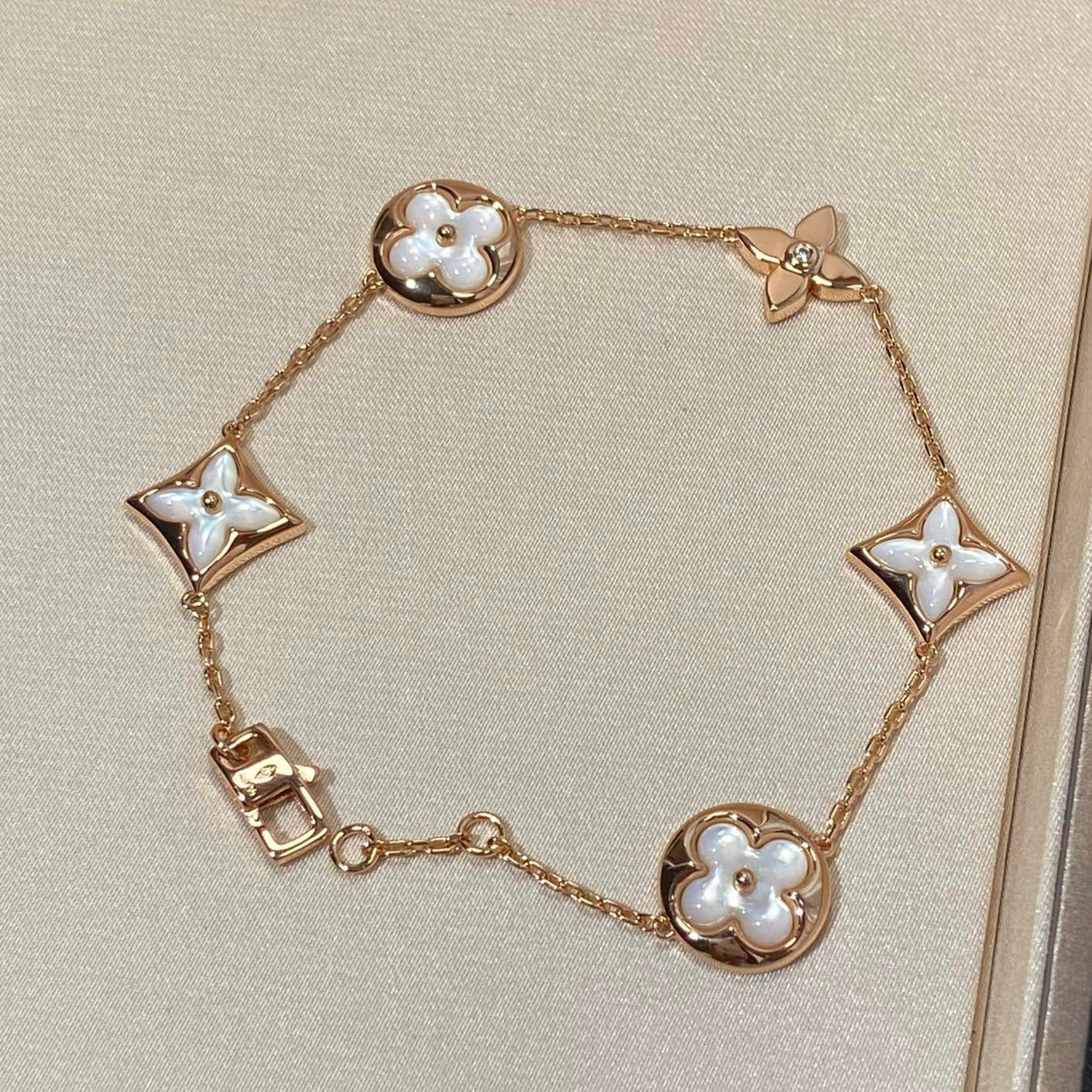 [baslovejewels]STAR AND SUN 5 MOTIF MOP PINK GOLD BRACELET